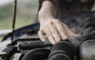 Overheating car engine in North Lakes workshop.