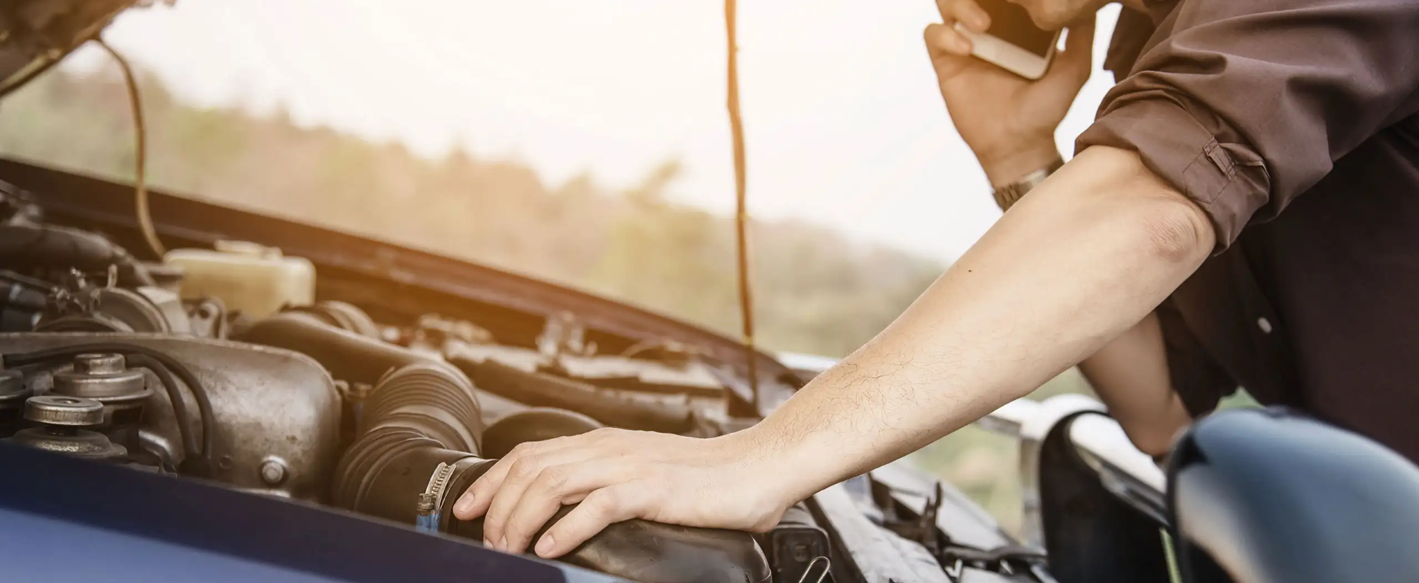 Mechanic performing professional car AC servicing and inspection 