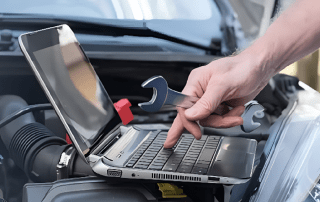 Expert mechanic performing routine vehicle maintenance